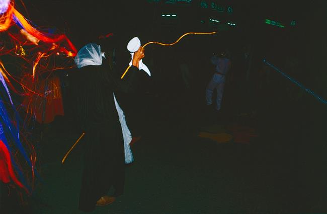 Alt'El grupo en una comparsa de noche'.